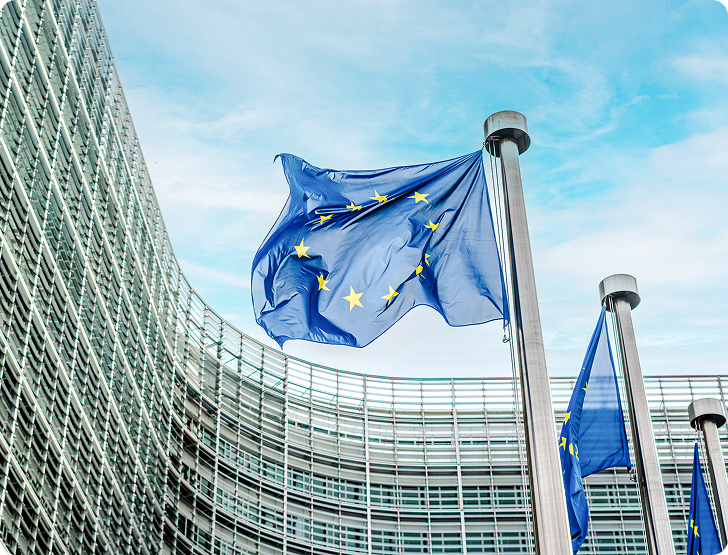 European flags in front of the European Commission building